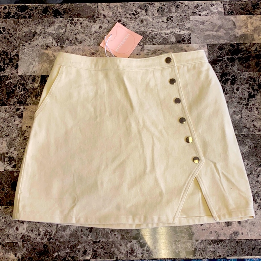 Kittenish corduroy tan skirt with pockets